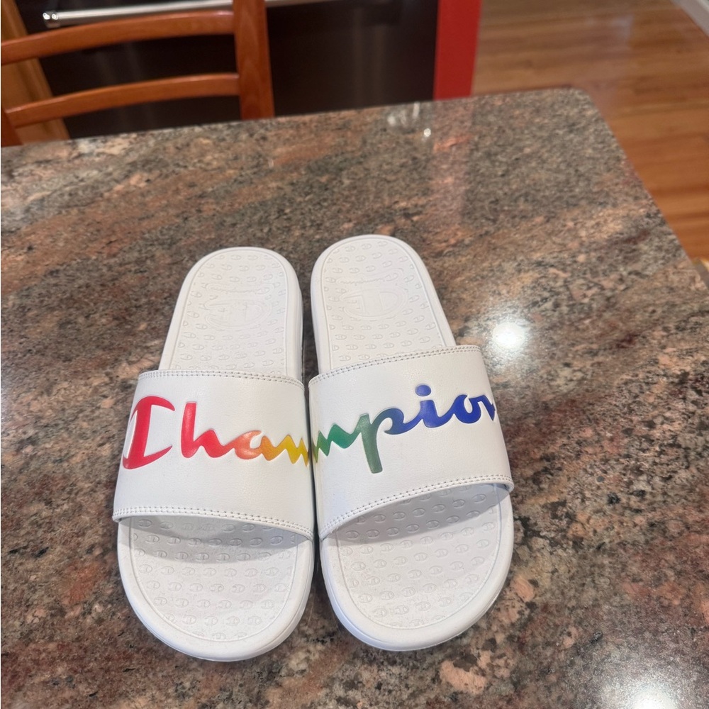 Champion slides. Great footbed. Split design for Champion script. So cute.